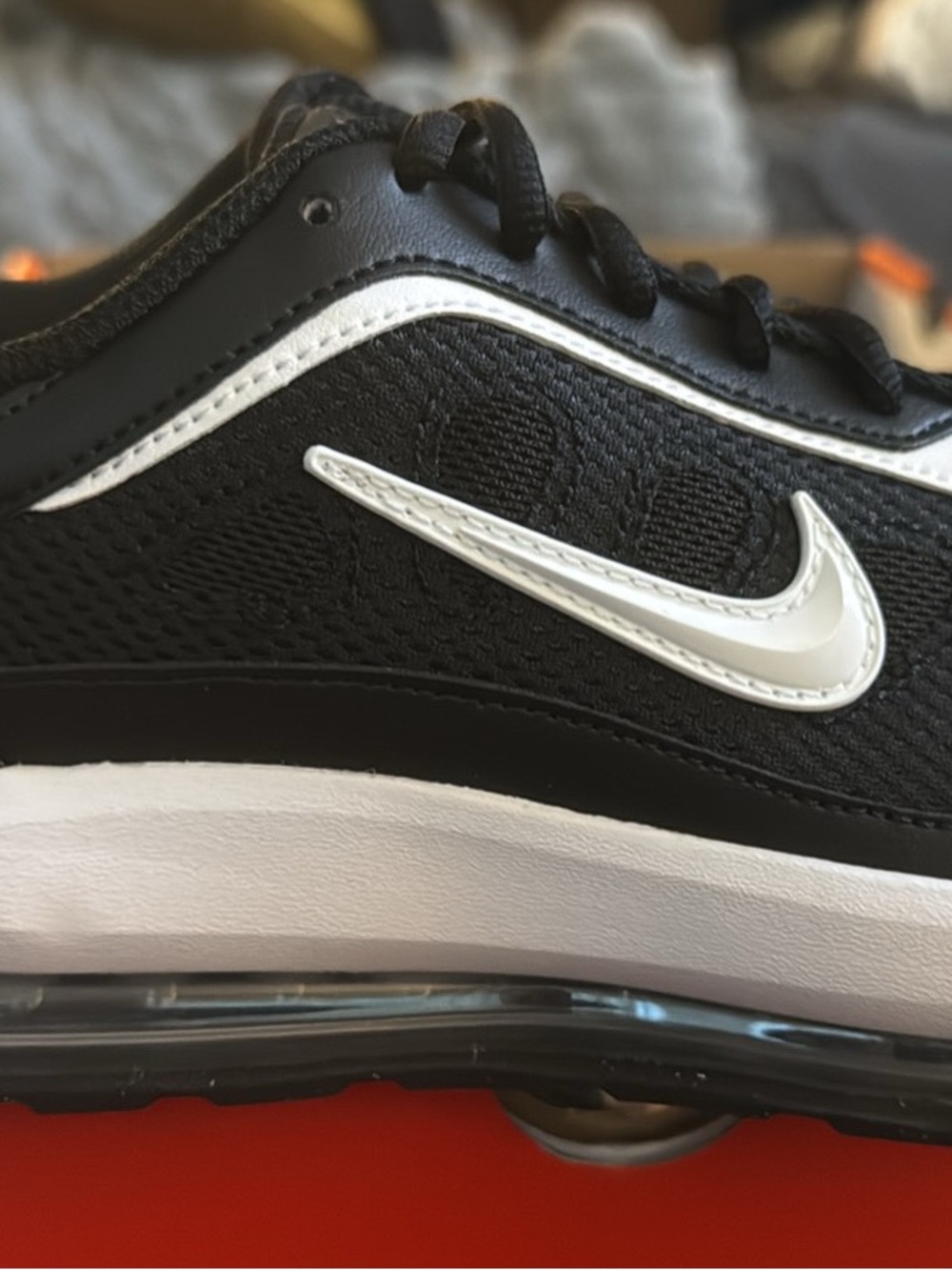 Nike Black and White Low-Top Air Cushion Sneakers
